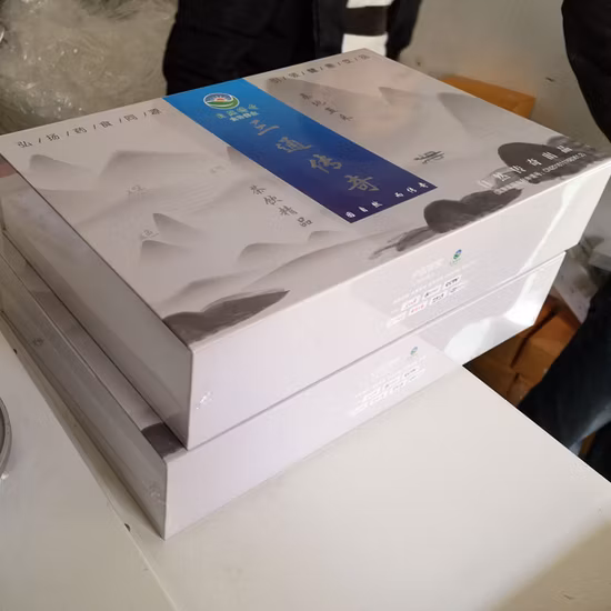 安価なノートブックシュリンク包装機。 ブックフィルム熱収縮包装機
